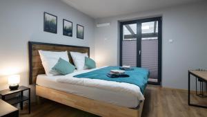 Postel nebo postele na pokoji v ubytování Apartamenty Sun & Snow Siedlisko Palenica