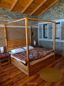 Ένα ή περισσότερα κρεβάτια σε δωμάτιο στο Meraki Huts