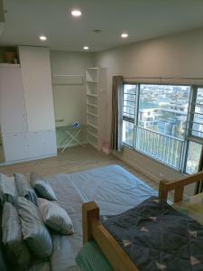 Vuode tai vuoteita majoituspaikassa 溫馨小屋