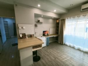Majoituspaikan 溫馨小屋 keittiö tai keittotila