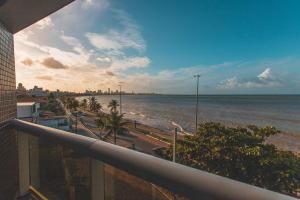 a view of the ocean from a balcony of a building at Verdegreen Hotel in João Pessoa