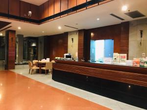 TV tai viihdekeskus majoituspaikassa 溫馨小屋