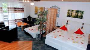 Katil atau katil-katil dalam bilik di Appartements 4U Rodenbach +44 gambar