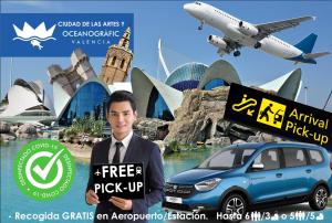 a man standing next to a car in front of a city at JL Ciudad de las Artes in Valencia