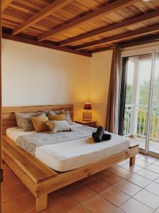 Postel nebo postele na pokoji v ubytování Gîte Carmelie + 10 fotografií