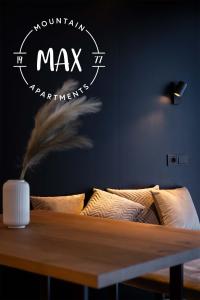 Posteľ alebo postele v izbe v ubytovaní Max Mountain Apartments
