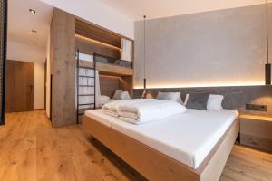 Posteľ alebo postele v izbe v ubytovaní Max Mountain Apartments