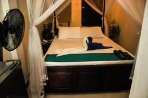 Katil atau katil-katil dalam bilik di Gem Light Guest House