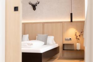 Ένα ή περισσότερα κρεβάτια σε δωμάτιο στο Max Mountain Apartments
