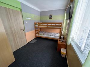 Posteľ alebo postele v izbe v ubytovaní Pension Martinské údolí - dependance