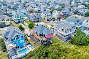 an aerial view of a residential neighborhood with houses at Shared Dreams OS23 in Corolla