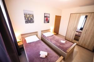 Posteľ alebo postele v izbe v ubytovaní Villa Levatinka + 34 fotografií