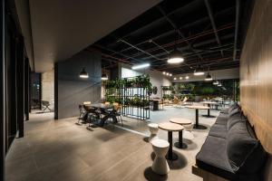 Area soggiorno di Go Living and Suites - Jalo Rent