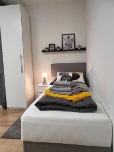 Postel nebo postele na pokoji v ubytování Leon2