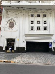 a building with a person standing in front of it at RECOLETA STUDIO in Buenos Aires