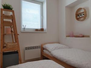 Vuode tai vuoteita majoituspaikassa Apartmány Břachovna