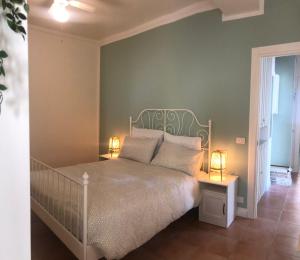 Posteľ alebo postele v izbe v ubytovaní La casa di Ari
