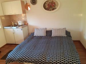 Postel nebo postele na pokoji v ubytování Studio apartman Miko