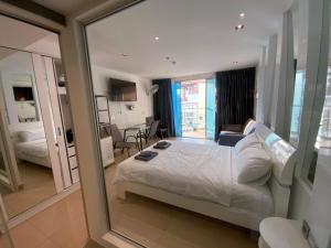 Katil atau katil-katil dalam bilik di Sands Condo SeaView 012 +12 gambar