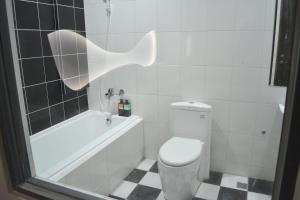 Baðherbergi á CoCo Motel Boutique