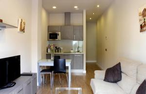 Kuchyňa alebo kuchynka v ubytovaní SEVITUR Seville Comfort Apartments