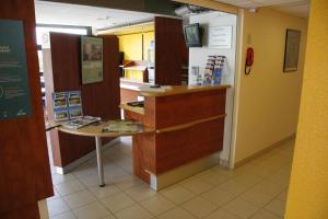 O saguão ou recepção de ibis budget Amboise