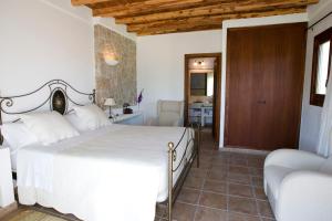 Postel nebo postele na pokoji v ubytování Agroturismo Sa Vinya d'en Palerm