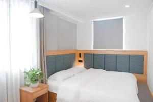 Postel nebo postele na pokoji v ubytování Travel light hostel