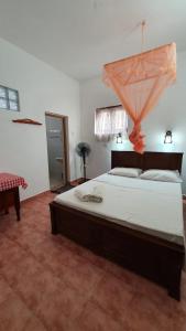 Postel nebo postele na pokoji v ubytování Guesthouse Kind and Love