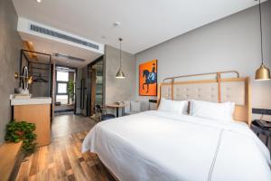 Fotografija v galeriji nastanitve 银座佳驿精致酒店济南英雄山立交桥鲁能领秀城店 v mestu Jinan
