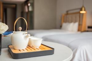 Fotografija v galeriji nastanitve 银座佳驿精致酒店济南英雄山立交桥鲁能领秀城店 v mestu Jinan