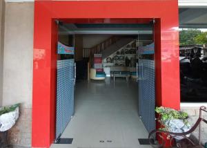 Fotografie z fotogalerie ubytování RedDoorz near Poso City Mall v destinaci Poso