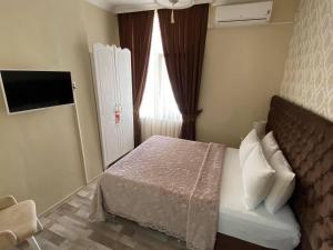 Una cama o camas en una habitación de Otantik Shumen