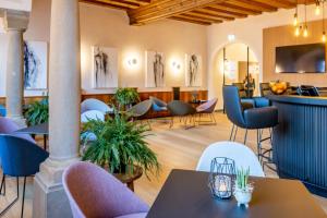 TV a/nebo společenská místnost v ubytování Stadthotel Styria