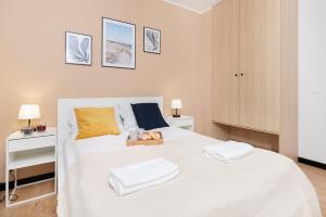 Postel nebo postele na pokoji v ubytování Seaview Apartment Nexo by Renters Prestige