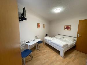 Giường trong phòng chung tại Ferien- & Monteurzimmer Markhausen