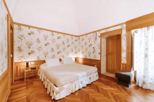 Postel nebo postele na pokoji v ubytování Santa Rosa Relais