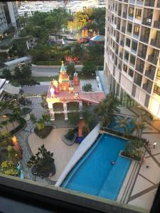 an aerial view of a resort with a swimming pool at i-Suite, i-City by Mohas Homes in Shah Alam +4 photos