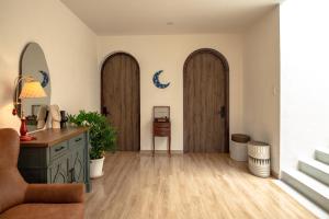 Posezení v ubytování Hè Maison Boutique Stay & café
