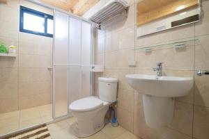 Koupelna v ubytování Jialai Homestay