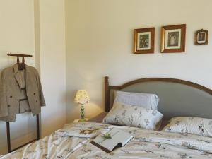 Postel nebo postele na pokoji v ubytování Hè Maison Boutique Stay & café