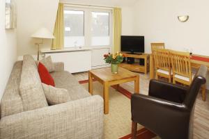 Et tv og/eller underholdning på Ferienwohnung Mare Nostrum 9