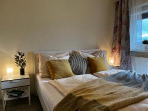 Posteľ alebo postele v izbe v ubytovaní Apartmány Friends Tatry