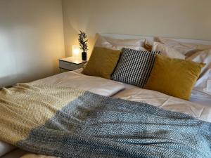Posteľ alebo postele v izbe v ubytovaní Apartmány Friends Tatry