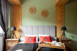 Łóżko lub łóżka w pokoju w obiekcie Apartament Natura Zakopane