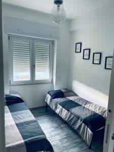 A bed or beds in a room at Very House