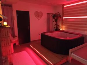 Posteľ alebo postele v izbe v ubytovaní Private Relax Armonia Wellness Apartment