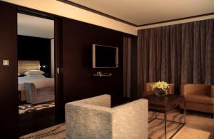 TV a/nebo společenská místnost v ubytování Hyatt Regency Kyiv