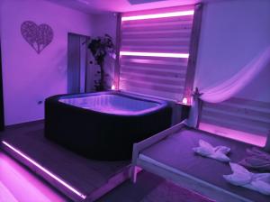 Posteľ alebo postele v izbe v ubytovaní Private Relax Armonia Wellness Apartment