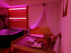 Posteľ alebo postele v izbe v ubytovaní Private Relax Armonia Wellness Apartment